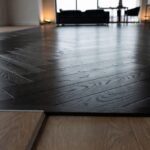 What Separates a Good Floor from a Great One Black Engineered, Herringbone, and WPC Flooring